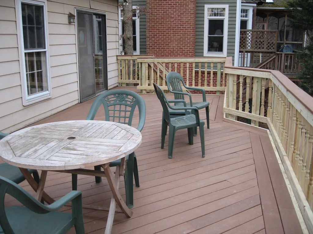 Composite deck with railings and tables